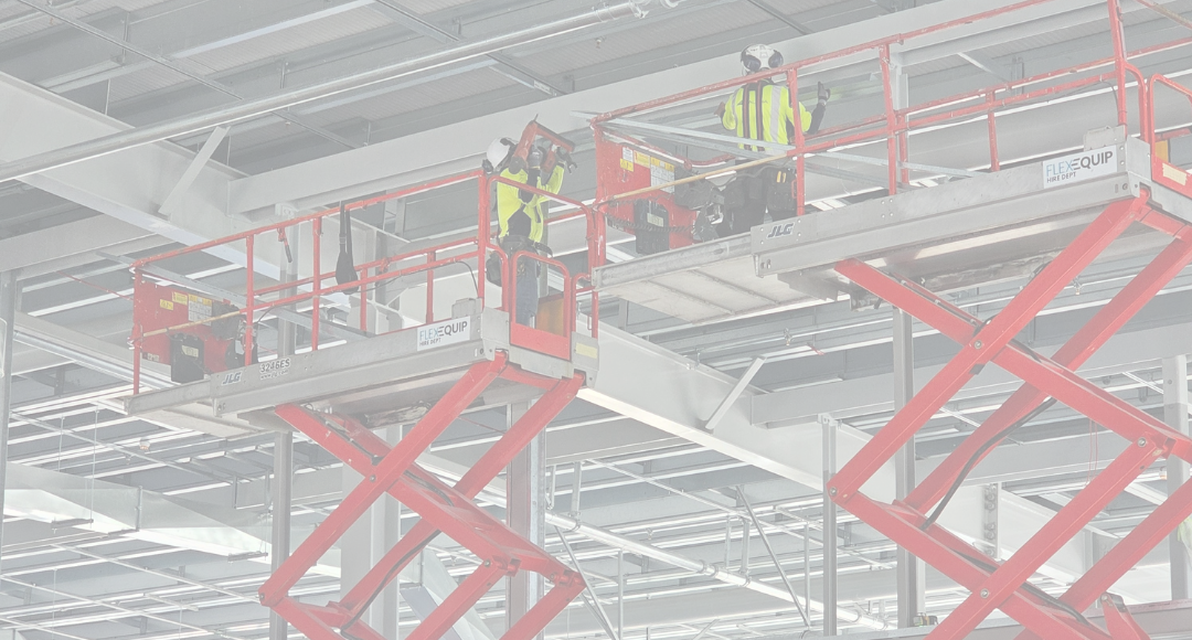 FlexEquip scissor lifts working on a job site in Auckland
